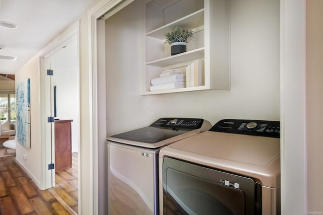 12870 Circulo Dardo, San Diego, CA 92128 - laundry area featuring washing machine and clothes dryer and wood finished floors