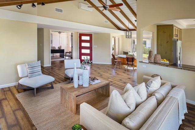 12870 Circulo Dardo, San Diego, CA 92128 - living room featuring a ceiling fan, arched walkways, beamed ceiling, wood finished floors, and high vaulted ceiling
