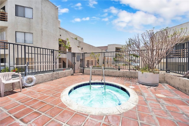 1118 Valencia St Unit 120, Los Angeles, CA 90015 - view of swimming pool featuring a hot tub and a patio