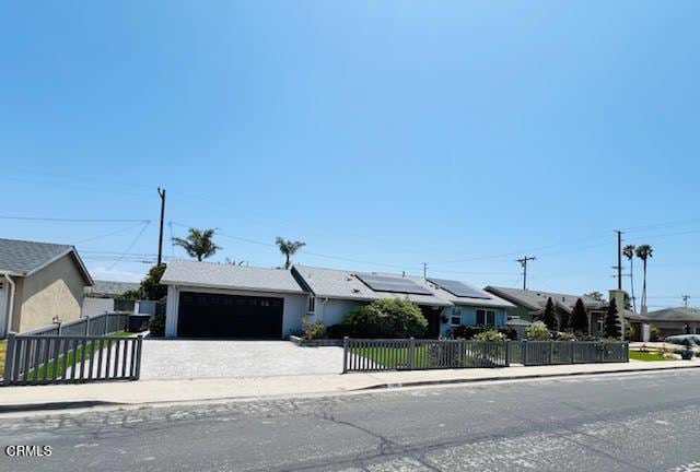 1900 Piedmont St, Oxnard, CA 93035 - ranch-style house featuring a fenced front yard, a garage, and driveway