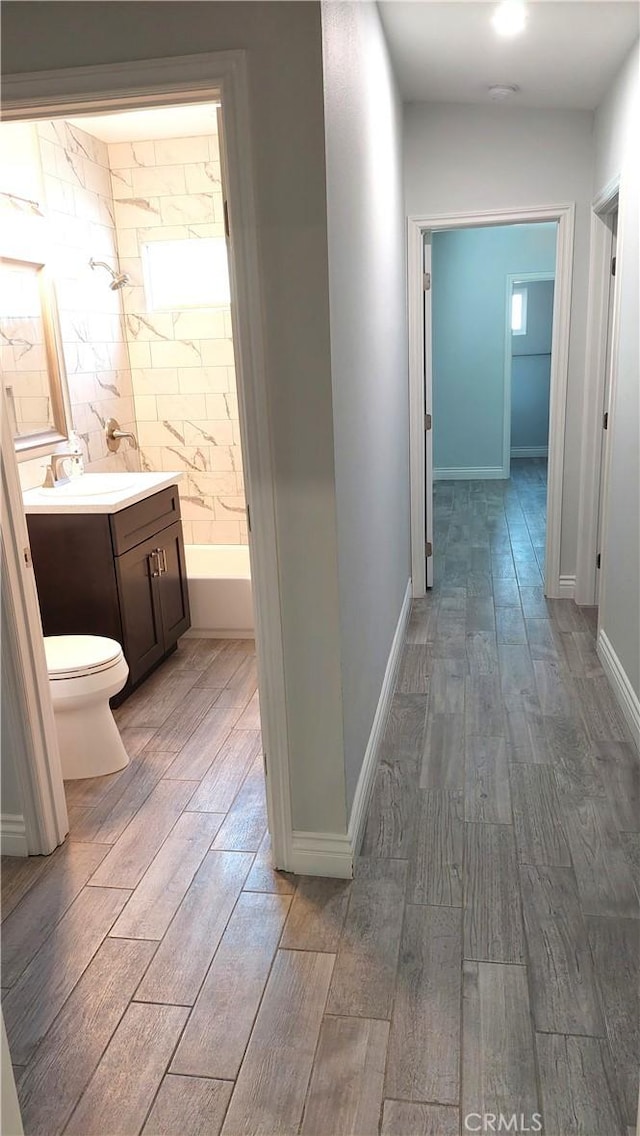 8649 Cantaloupe Ave, Panorama City, CA 91402 - hall featuring wood finished floors and a sink