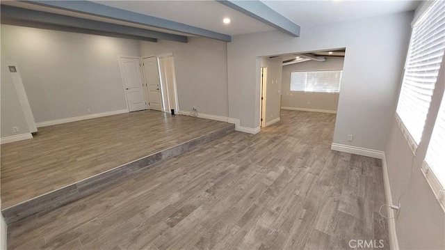 8649 Cantaloupe Ave, Panorama City, CA 91402 - empty room featuring beamed ceiling, wood finished floors, and recessed lighting