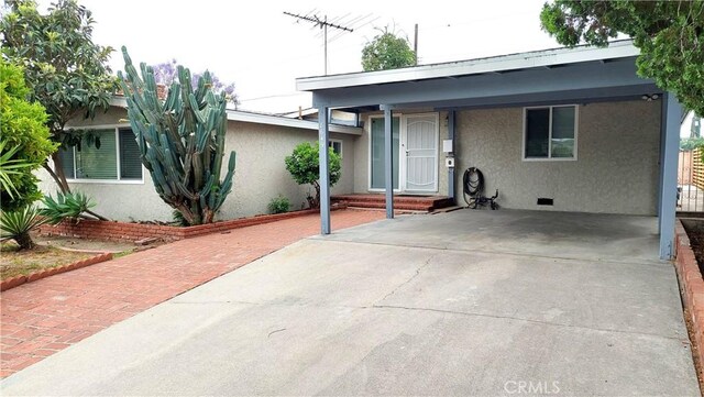 8649 Cantaloupe Ave, Panorama City, CA 91402 - view of front facade with stucco siding and crawl space