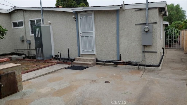 8649 Cantaloupe Ave, Panorama City, CA 91402 - back of property with stucco siding and a patio area
