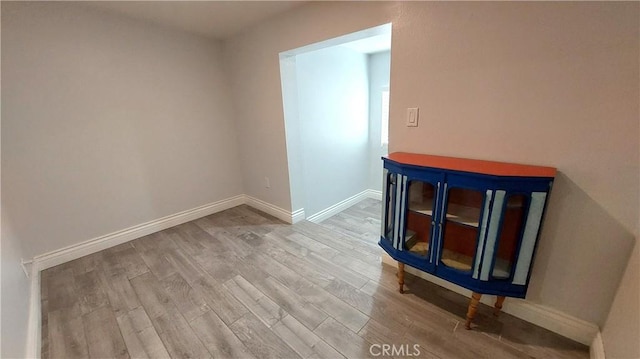 8649 Cantaloupe Ave, Panorama City, CA 91402 - unfurnished room featuring wood finished floors and baseboards