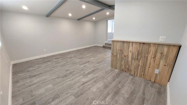 8649 Cantaloupe Ave, Panorama City, CA 91402 - unfurnished room featuring wood finished floors, recessed lighting, and beam ceiling