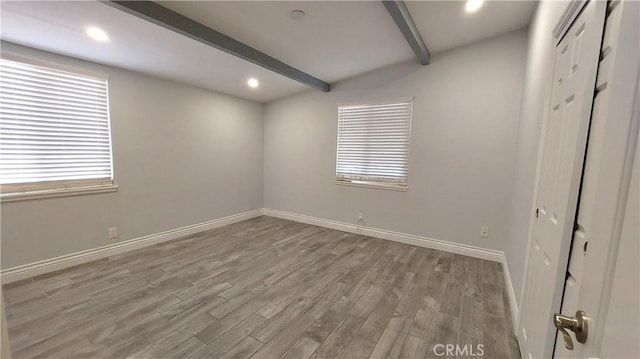 8649 Cantaloupe Ave, Panorama City, CA 91402 - empty room featuring beam ceiling, wood finished floors, and recessed lighting