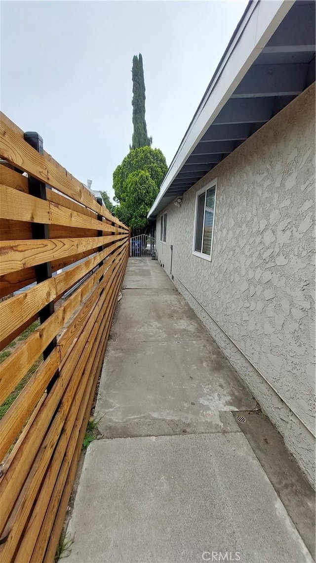 8649 Cantaloupe Ave, Panorama City, CA 91402 - view of side of property with stucco siding