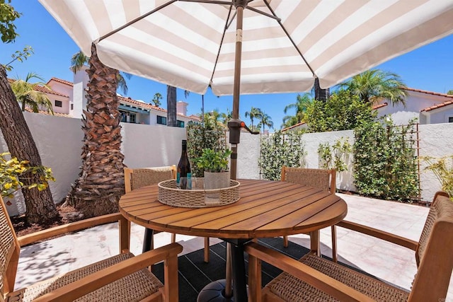 3649 Azure Cir, Carlsbad, CA 92008 - fenced backyard featuring a patio and outdoor dining space