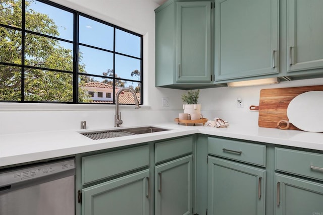 3649 Azure Cir, Carlsbad, CA 92008 - kitchen with stainless steel dishwasher, green cabinetry, and light countertops
