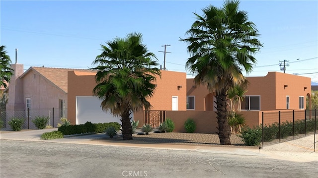 6577 Morongo Rd Unit 29, Palms, CA 92277 - view of front facade featuring stucco siding