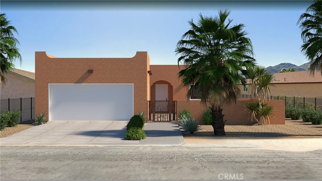 6577 Morongo Rd Unit 29, Palms, CA 92277 - adobe home with driveway, stucco siding, and an attached garage