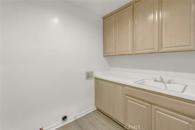 6041 Calle Mirador, Yorba Linda, CA 92886 - washroom with washer hookup, cabinet space, light wood-style flooring, and hookup for a gas dryer