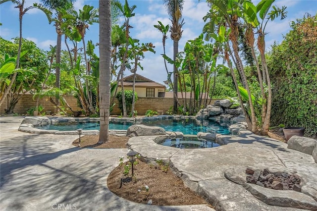 6041 Calle Mirador, Yorba Linda, CA 92886 - view of pool with a fenced backyard, a pool with connected hot tub, and a patio