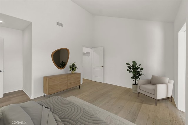 6041 Calle Mirador, Yorba Linda, CA 92886 - living area featuring light wood-type flooring and high vaulted ceiling