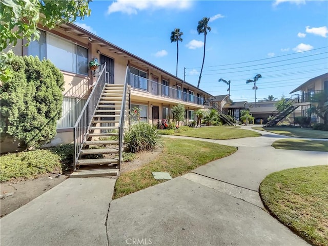 1920 N H St Unit 251, Oxnard, CA 93036 - view of property's community featuring stairway and a yard