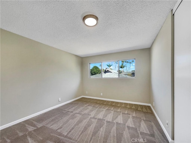 1920 N H St Unit 251, Oxnard, CA 93036 - spare room featuring carpet and a textured ceiling