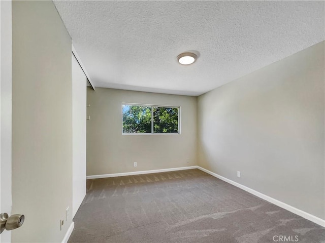 1920 N H St Unit 251, Oxnard, CA 93036 - carpeted spare room featuring a textured ceiling