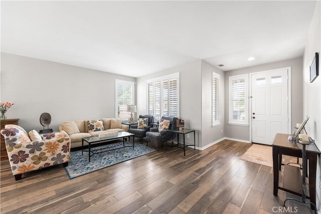 42639 Biscay, Lancaster, CA 93536 - living room featuring dark wood-style floors and recessed lighting
