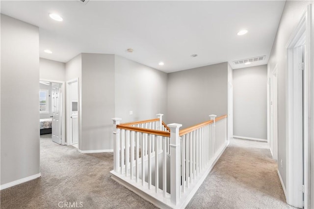 42639 Biscay, Lancaster, CA 93536 - corridor with carpet floors, an upstairs landing, and recessed lighting