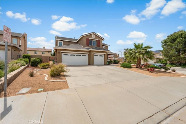 42639 Biscay, Lancaster, CA 93536 - view of front facade featuring stucco siding, an attached garage, and concrete driveway
