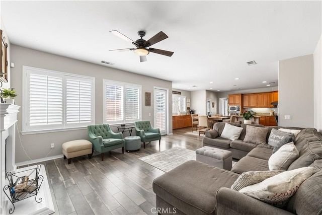 42639 Biscay, Lancaster, CA 93536 - living room featuring ceiling fan, wood finished floors, recessed lighting, and a fireplace