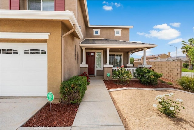 42639 Biscay, Lancaster, CA 93536 - doorway to property with a porch and stucco siding