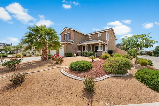 42639 Biscay, Lancaster, CA 93536 - view of front of home featuring covered porch, an attached garage, driveway, and stucco siding