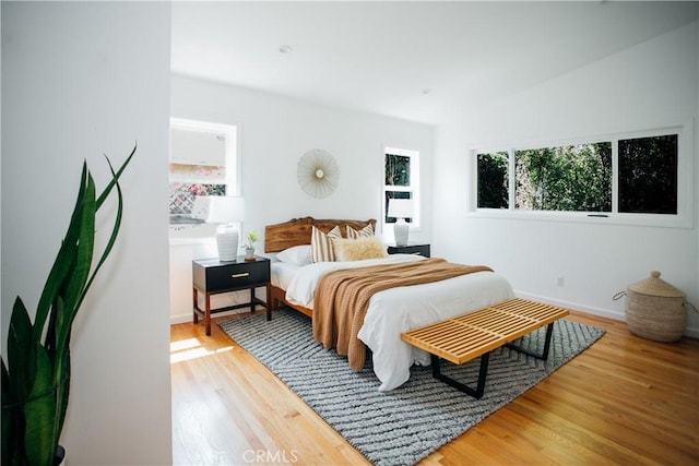17442 Burma St, Encino, CA 91316 - bedroom featuring multiple windows and wood finished floors