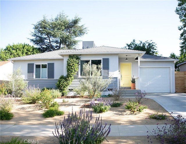 17442 Burma St, Encino, CA 91316 - ranch-style home featuring an attached garage, concrete driveway, and stucco siding