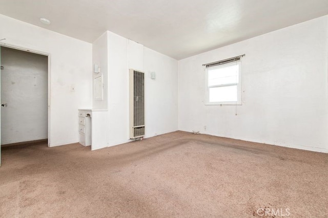 329 N Bushnell Ave, Alhambra, CA 91801 - carpeted spare room featuring a heating unit and a smoke detector