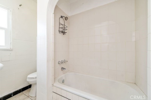 329 N Bushnell Ave, Alhambra, CA 91801 - bathroom with tile walls, tile patterned flooring, and bathtub / shower combination