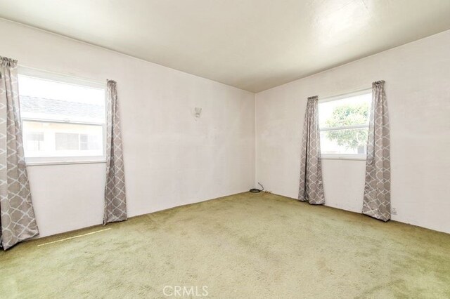 329 N Bushnell Ave, Alhambra, CA 91801 - empty room featuring carpet flooring