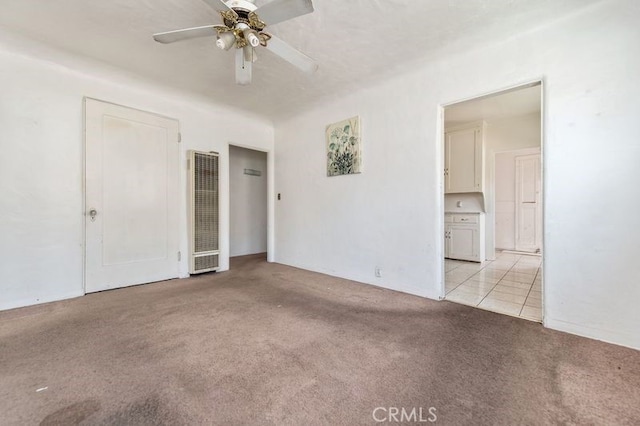 329 N Bushnell Ave, Alhambra, CA 91801 - unfurnished bedroom with a heating unit, light colored carpet, and a ceiling fan