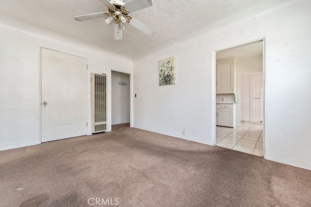 329 N Bushnell Ave, Alhambra, CA 91801 - unfurnished bedroom featuring a heating unit, light carpet, and a ceiling fan