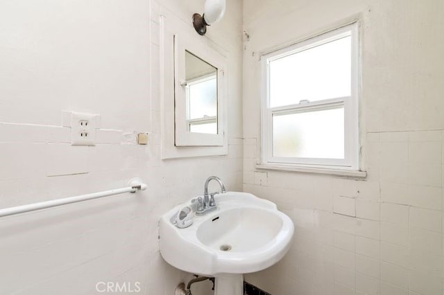 329 N Bushnell Ave, Alhambra, CA 91801 - bathroom featuring tile walls and healthy amount of natural light