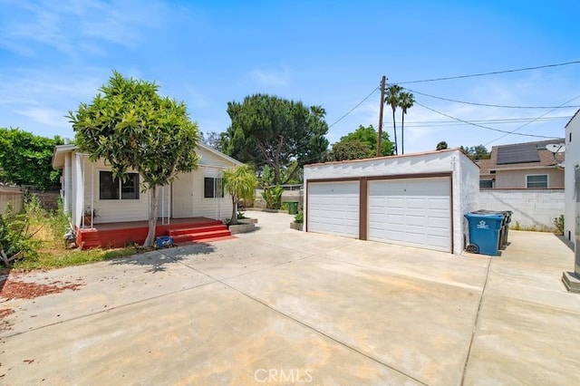 329 N Bushnell Ave, Alhambra, CA 91801 - view of front facade featuring a garage and an outdoor structure