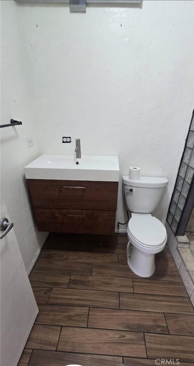 7744 Victor, Yucca Valley, CA 92284 - bathroom featuring vanity and wood tiled floors