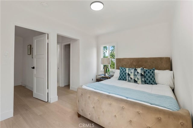 3024 Carl St, Riverside, CA 92507 - bedroom with light wood-type flooring and baseboards