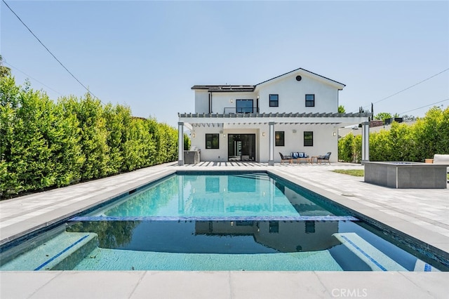 251 S Griffith Park Dr, Burbank, CA 91506 - back of house featuring a pool with connected hot tub, a pergola, a patio area, and stucco siding