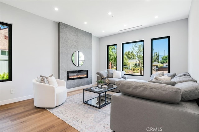 251 S Griffith Park Dr, Burbank, CA 91506 - living area featuring wood finished floors, recessed lighting, and a large fireplace