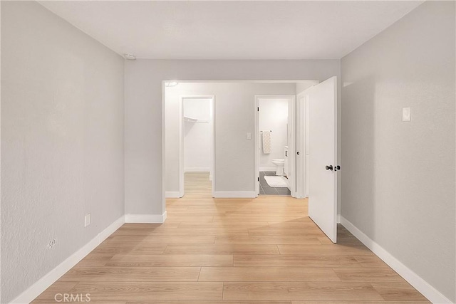 3096 Panorama Rd Unit A, Riverside, CA 92506 - empty room with light wood-style floors and baseboards