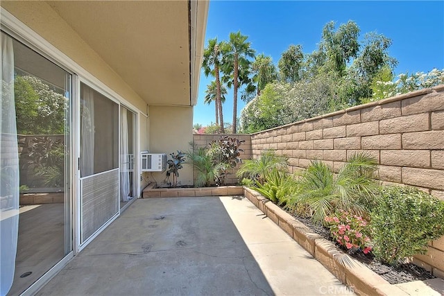 3096 Panorama Rd Unit A, Riverside, CA 92506 - fenced backyard featuring a patio area and a wall unit AC