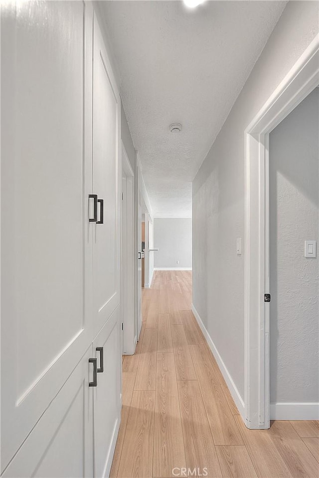 3096 Panorama Rd Unit A, Riverside, CA 92506 - corridor with light wood-style flooring and baseboards