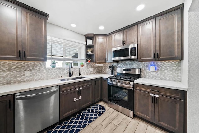 353 61st St, San Diego, CA 92114 - kitchen featuring stainless steel appliances, dark brown cabinetry, and recessed lighting