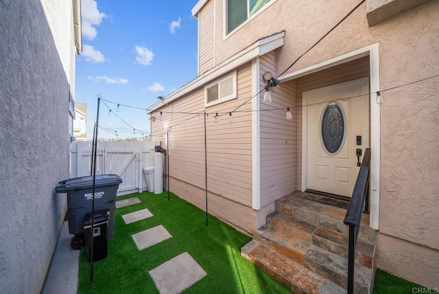 353 61st St, San Diego, CA 92114 - entrance to property featuring a gate and stucco siding