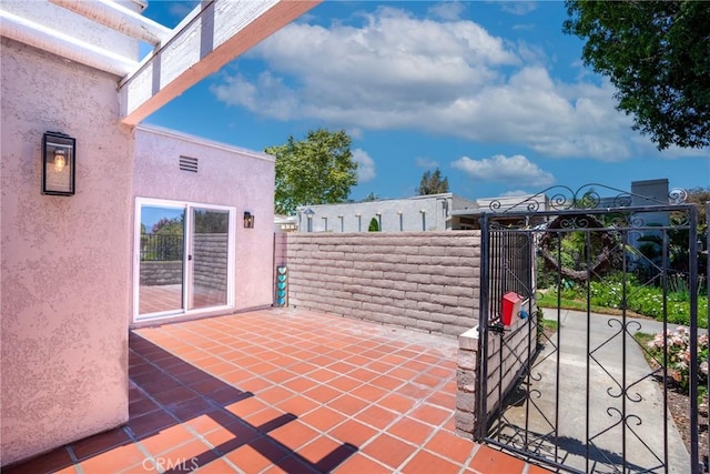 3066 Via Serena S Unit A, Laguna Woods, CA 92637 - view of patio featuring a gate
