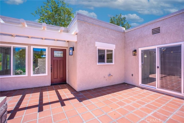 3066 Via Serena S Unit A, Laguna Woods, CA 92637 - entrance to property featuring stucco siding and a patio