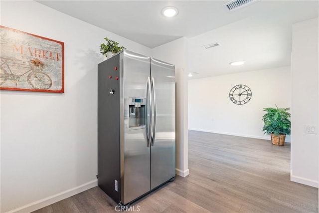 3066 Via Serena S Unit A, Laguna Woods, CA 92637 - kitchen featuring stainless steel refrigerator with ice dispenser, wood finished floors, and recessed lighting