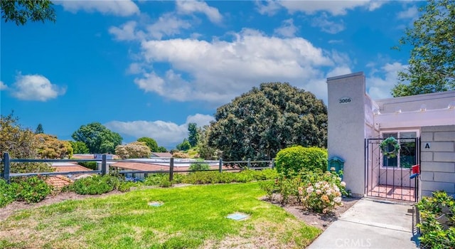 3066 Via Serena S Unit A, Laguna Woods, CA 92637 - view of yard with a gate